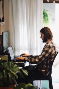 Man working as an outsourced paraplanner